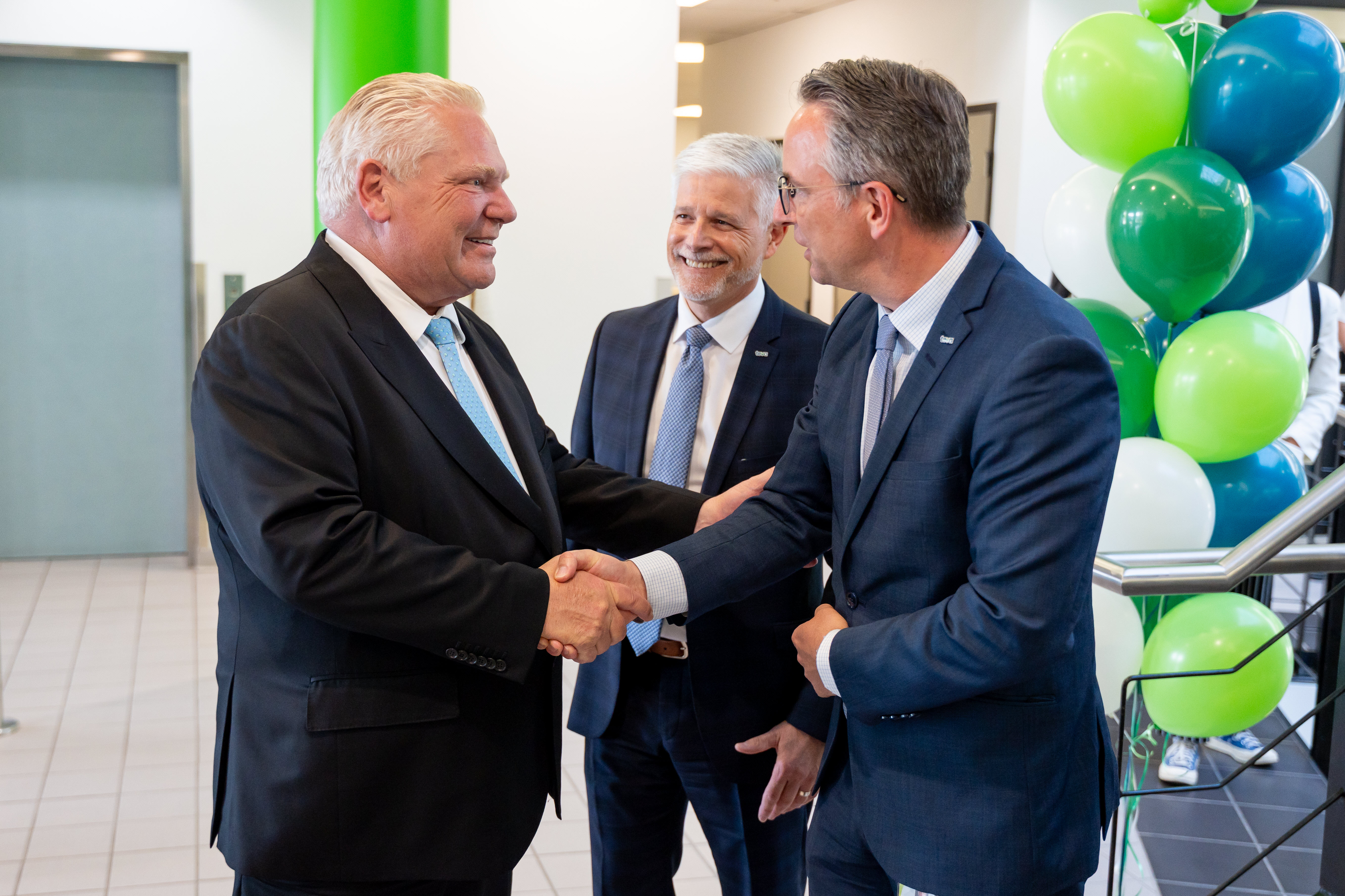 Shaking Premier's hand